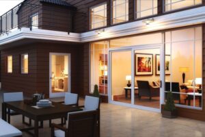 A large home has lots of frame windows as well as a frame sliding glass door.